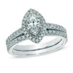 Anel em Ouro Branco 18k com Mourion Preto e Diamantes, 4mm